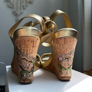 Unique gold color Coach sandal